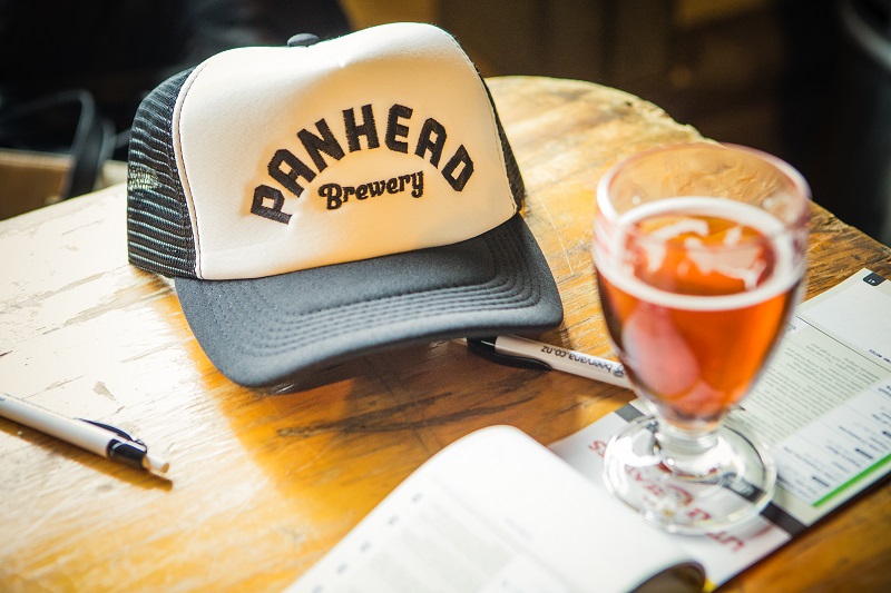 Image of a Panhead cap and beer at Beervana