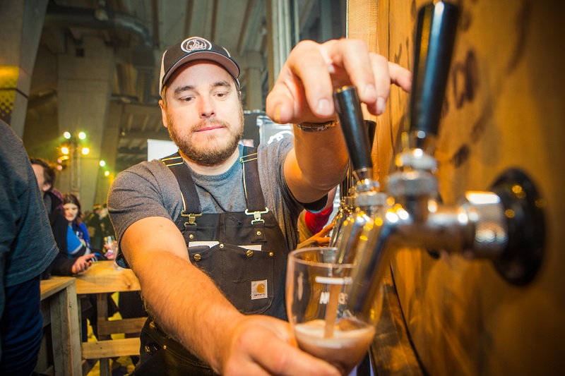 Beer being poured at Beervana 2015. 